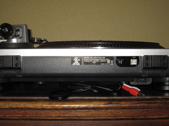 Photo shows the back side of the Audio-Technica AT-LP120-USB. Visible are the RCA and USB outputs and Line/Phono switch.