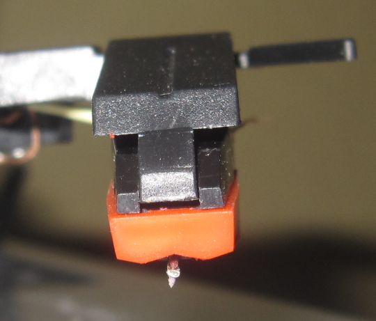 Close-up photo shows a crooked stylus attached to the Grace Digital Audio Vinylwriter (AVPUSB01S) USB turntable.