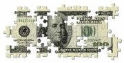 An illustration of a $100 bill jigsaw puzzle with several pieces missing.