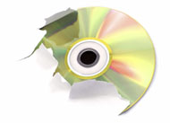 A CD rips through the page.