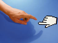 A mouse cursor reaches out to a human hand.